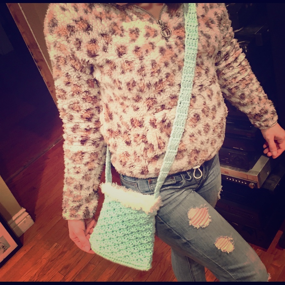 Across the body purse with plush accent